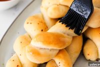 Crispy Homemade Garlic Breadsticks with Parmesan and Herbs