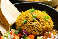 Authentic Pressure Cooker Chicken Biryani Recipe – Ready Fast