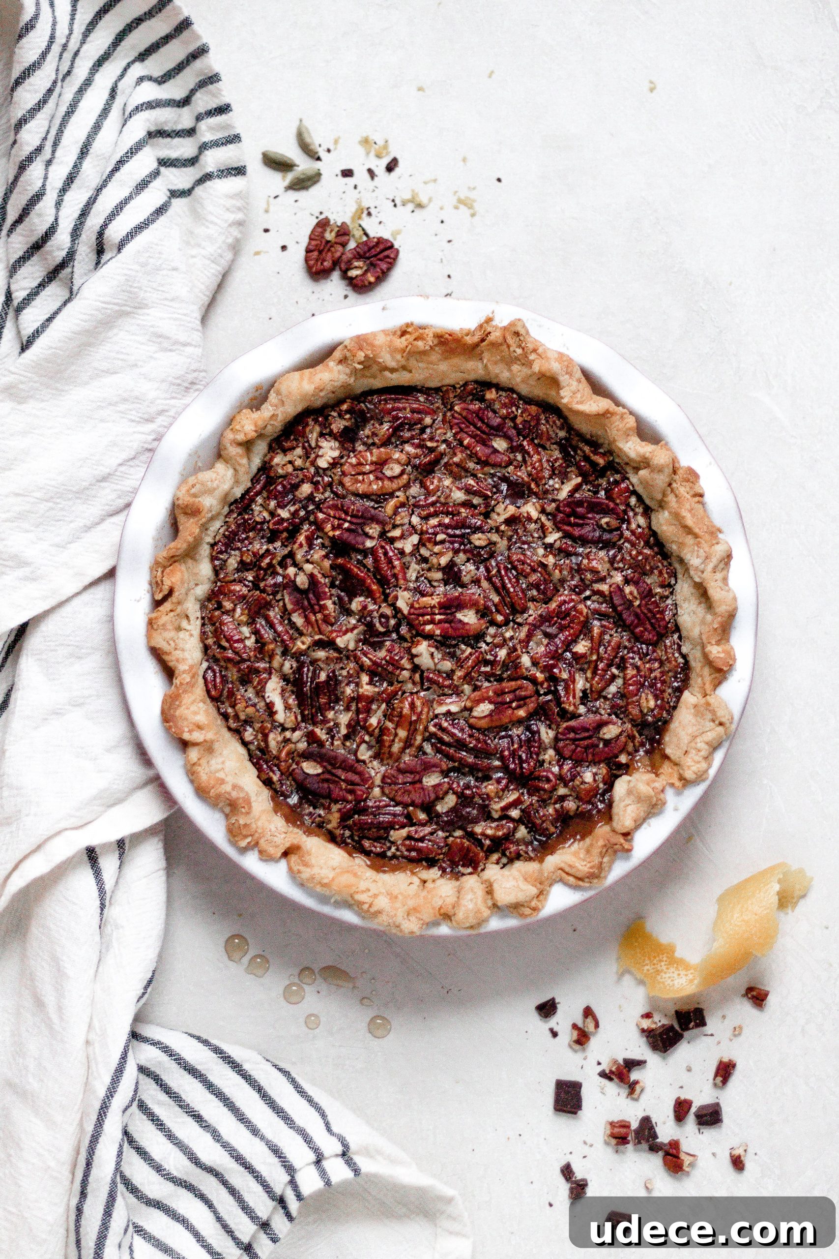 Vegan Maple Pecan Pie with Bittersweet Chocolate, Orange, and Cardamom