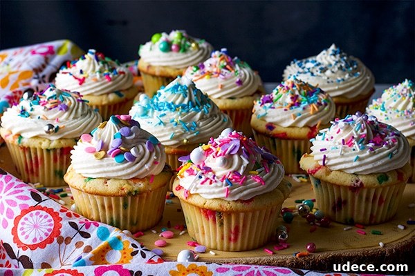 All-Butter Funfetti Cake & Cupcakes Recipe 6 A tray of Funfetti Cupcakes with Classic American Buttercream