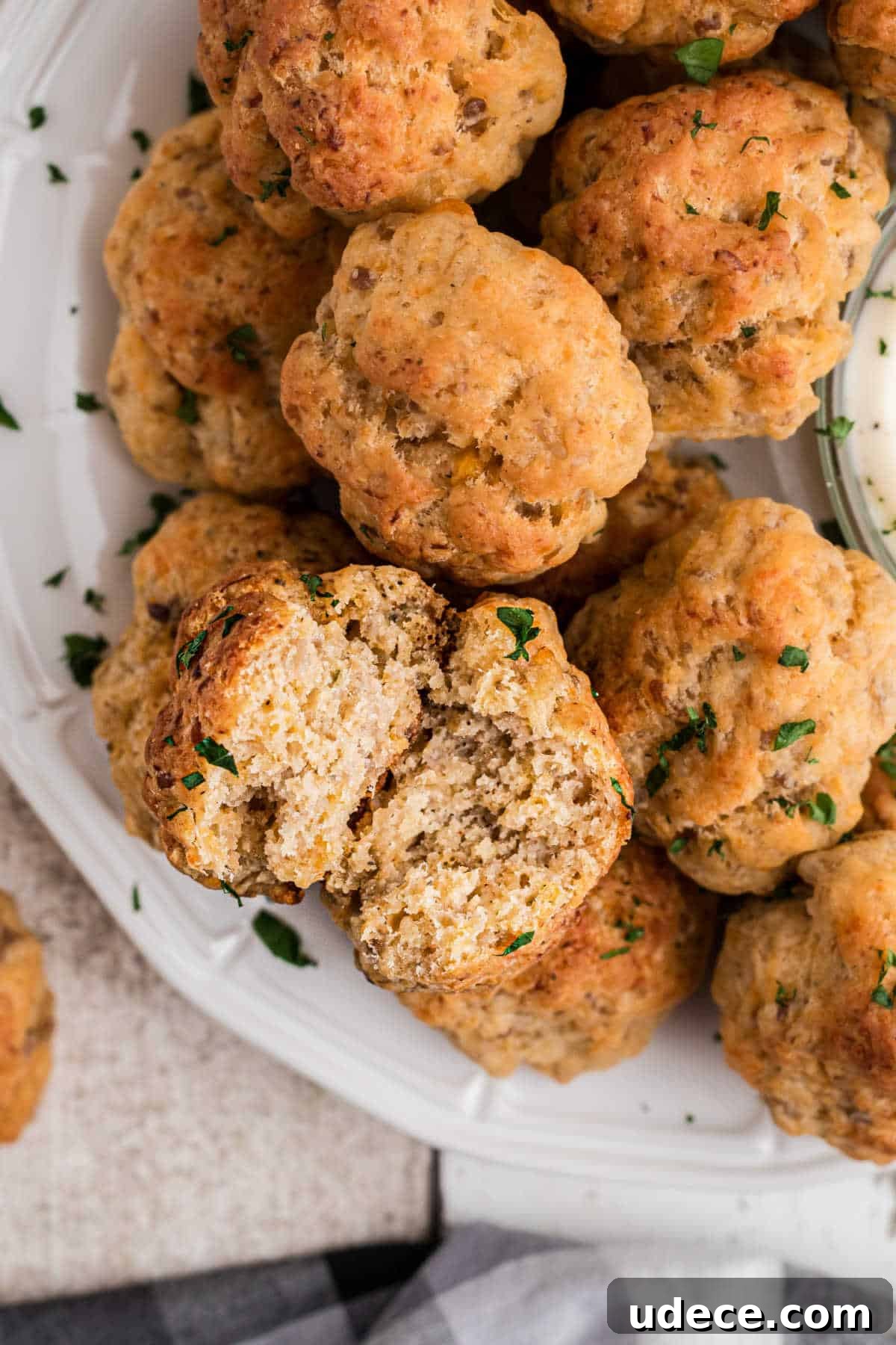 Cheddar Bay-Style Sausage Balls Recipe for Parties and Snacks 7 Overhead view of a cheddar bay sausage ball pulled open.