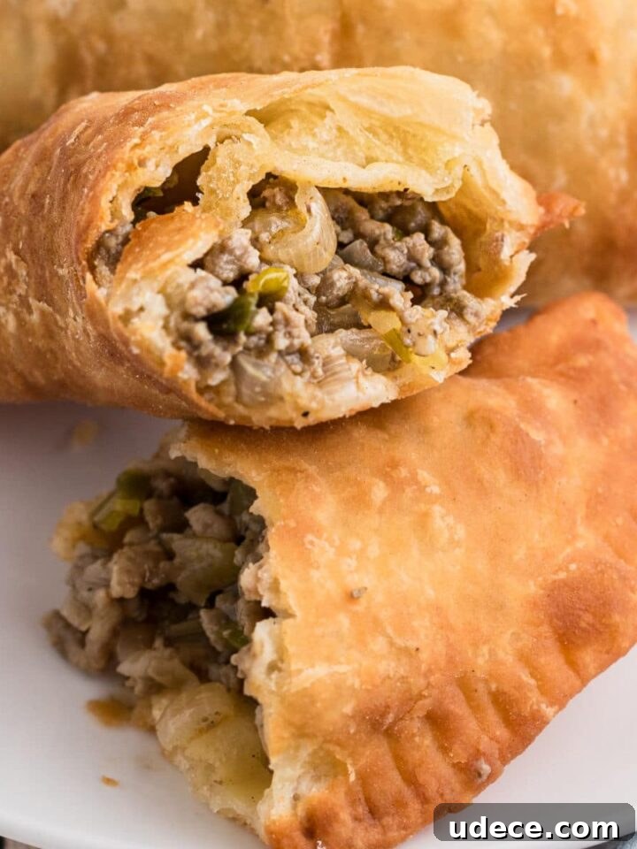 A natchitoches meat pie cut in half.