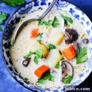 Homemade mushroom chunky soup in a blue bowl