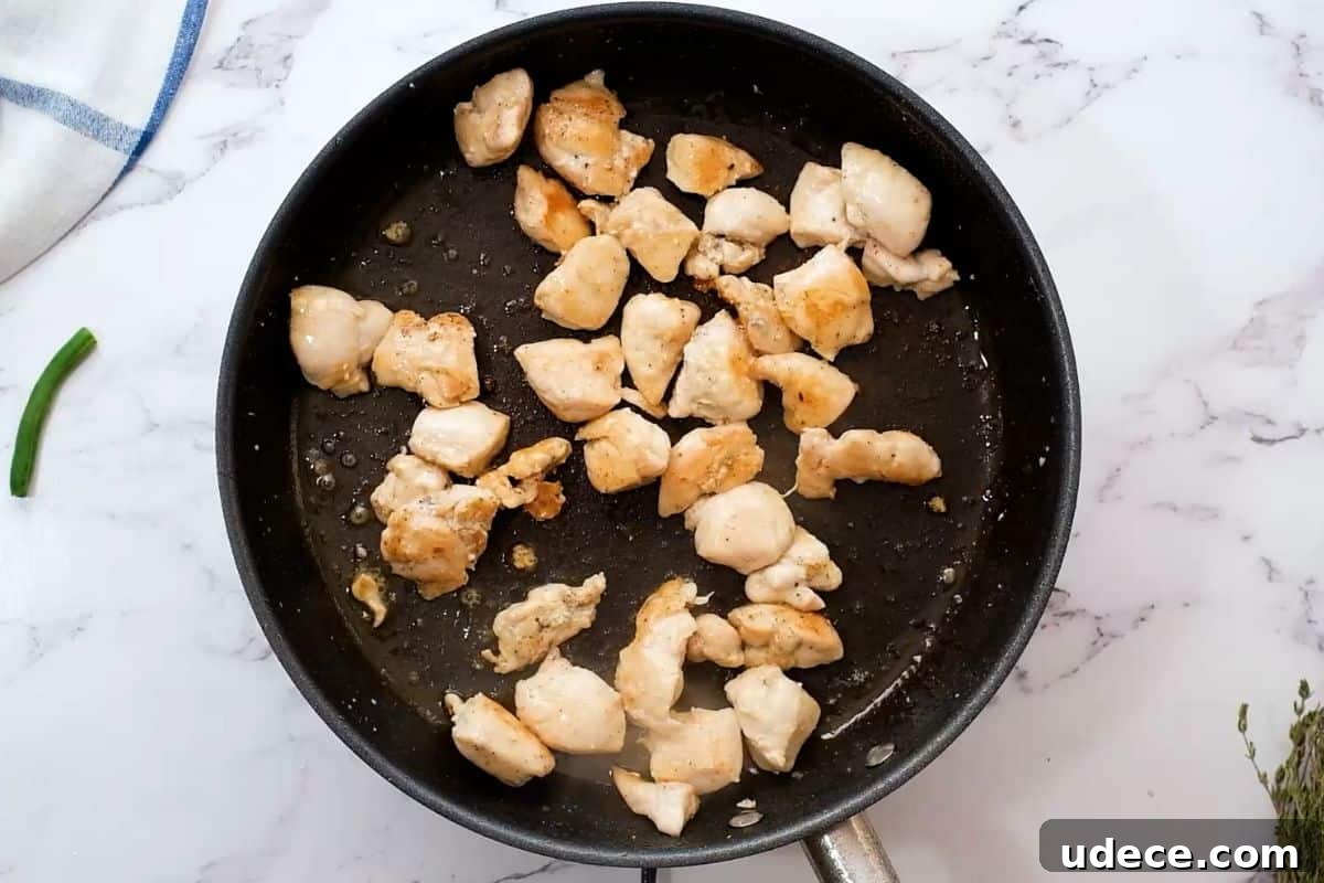 Easy Chicken Breast Recipe with Green Beans Chicken breast cubed in bite-sized pieces browned in skillet.
