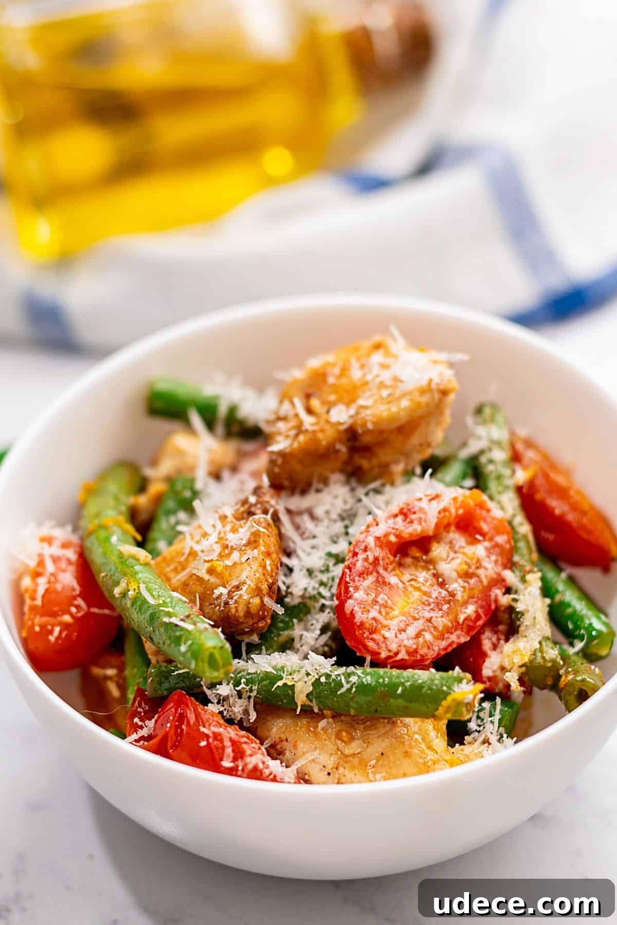 Chicken and Green Bean Skillet recipe Bowl of chicken and green beans with tomatoes.