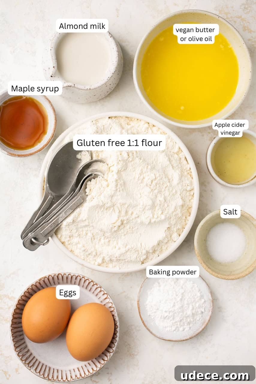 Fluffy Gluten-Free Biscuits with Optional Dairy-Free Version 3 ingredients for dairy free biscuits laid out on a photography backdrop in various size bowls