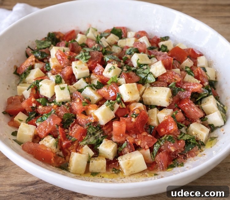 Chopped Caprese Toast: Fresh Tomato, Basil & Mozzarella Recipe 5 Step 2 How to make Caprese Toast: Toss ingredients with olive oil, garlic, and black pepper.