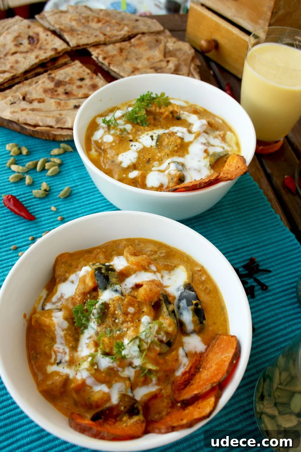 Roasted Eggplant & Sweet Potato Curry with Cheesy Paratha 11 Curry in bowls