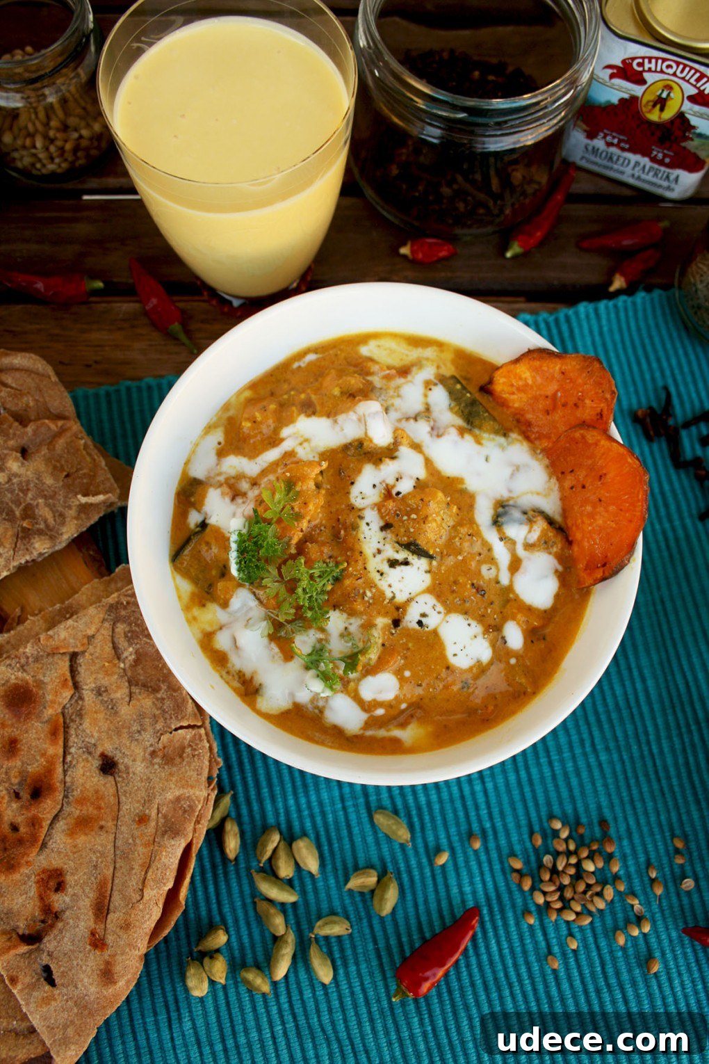 Roasted Eggplant & Sweet Potato Curry with Cheesy Paratha 6 Eggplant Curry in a Bowl with Mango Lassi