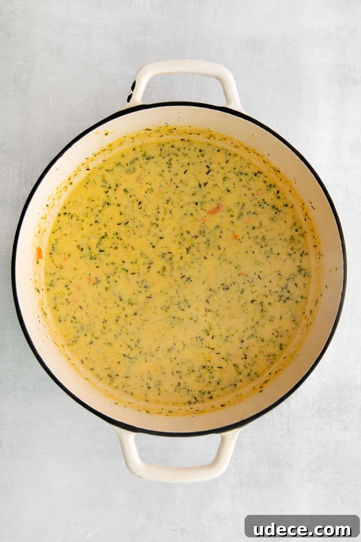 Creamy Broccoli, Potato & Cheddar Soup Recipe 7 Broccoli potato cheese soup in a pot.