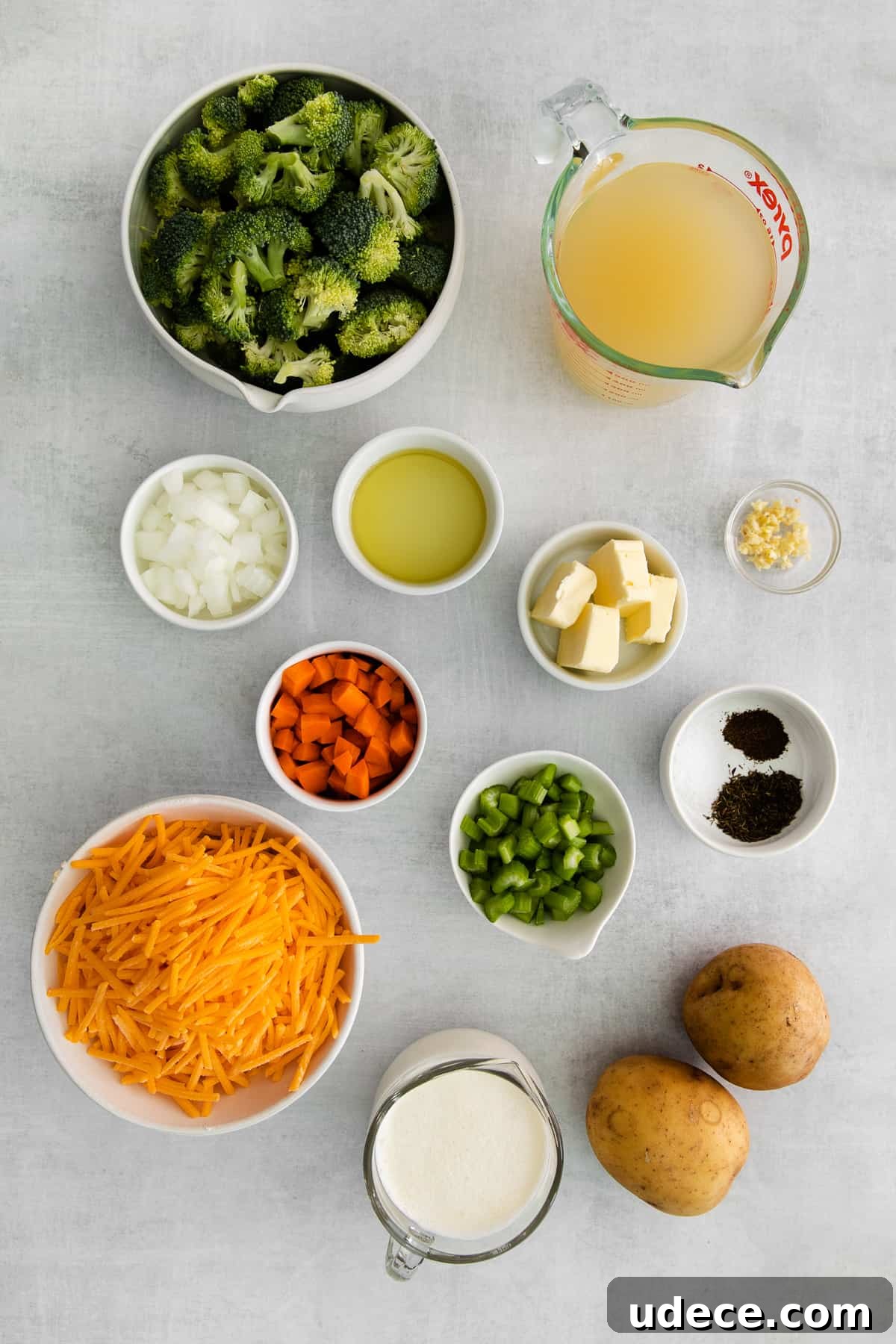 Creamy Broccoli, Potato & Cheddar Soup Recipe 3 All of the ingredients for broccoli potato cheese soup in small bowls.