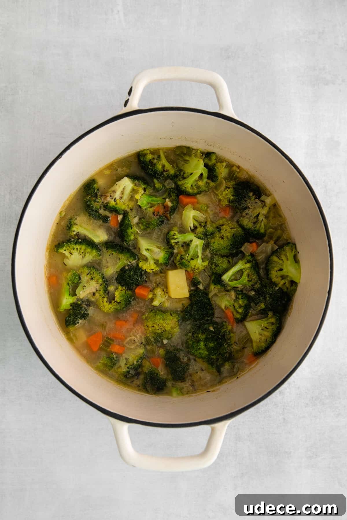 Creamy Broccoli, Potato & Cheddar Soup Recipe 4 Simmering all the vegetables together in a pot.