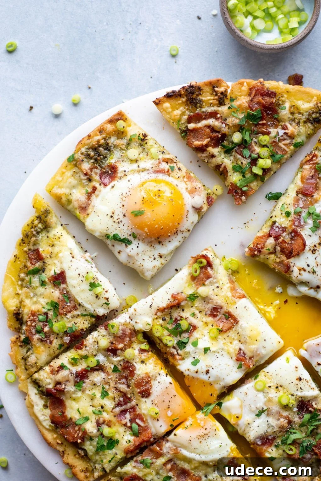 5-Ingredient Breakfast Pizza with Pesto and Crispy Bacon 9 Overhead shot of finished breakfast pizza.