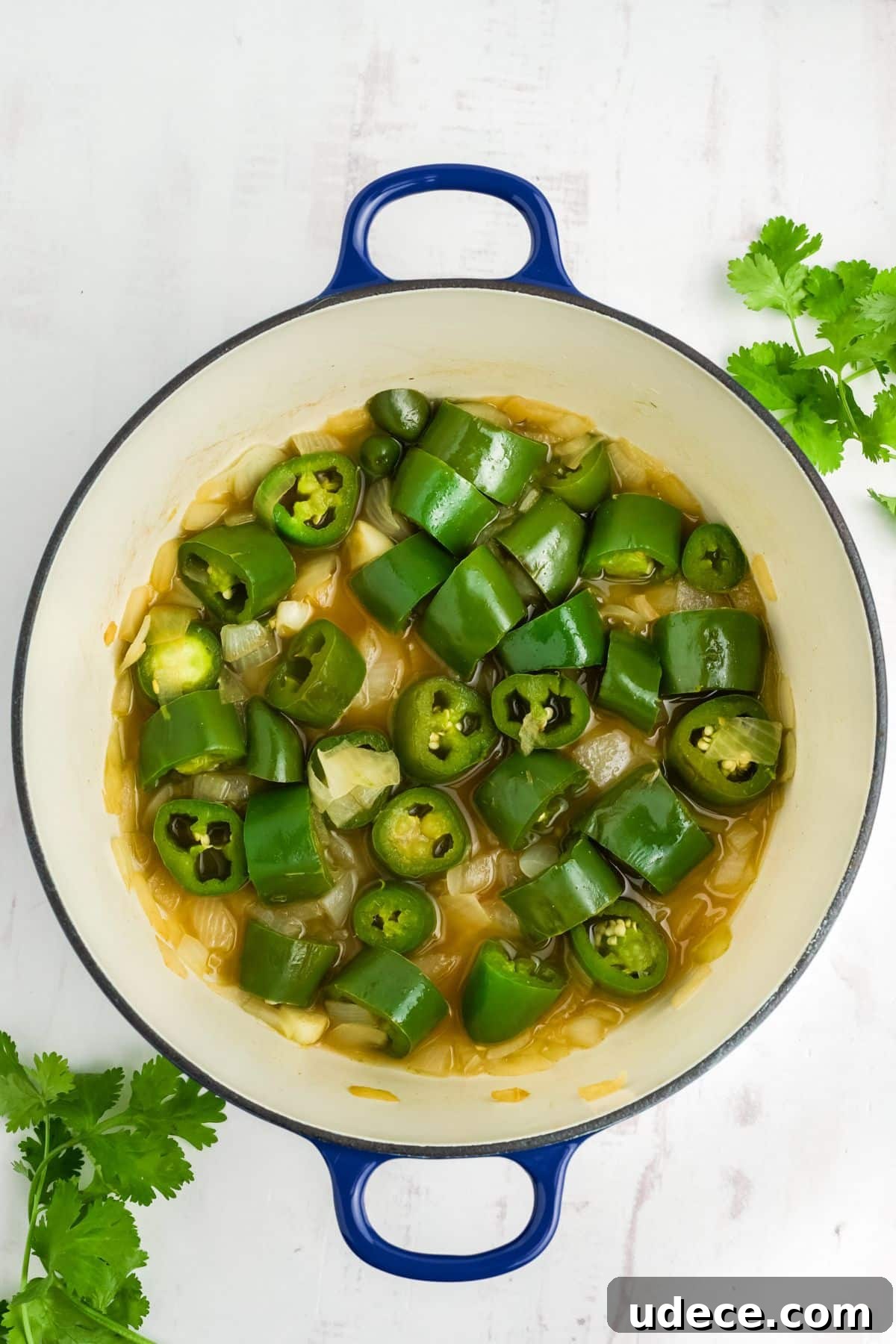 Homemade Jalapeño Hot Sauce Recipe for Bold Heat and Flavor 6 Jalapeno mixture cooked in a dutch oven.