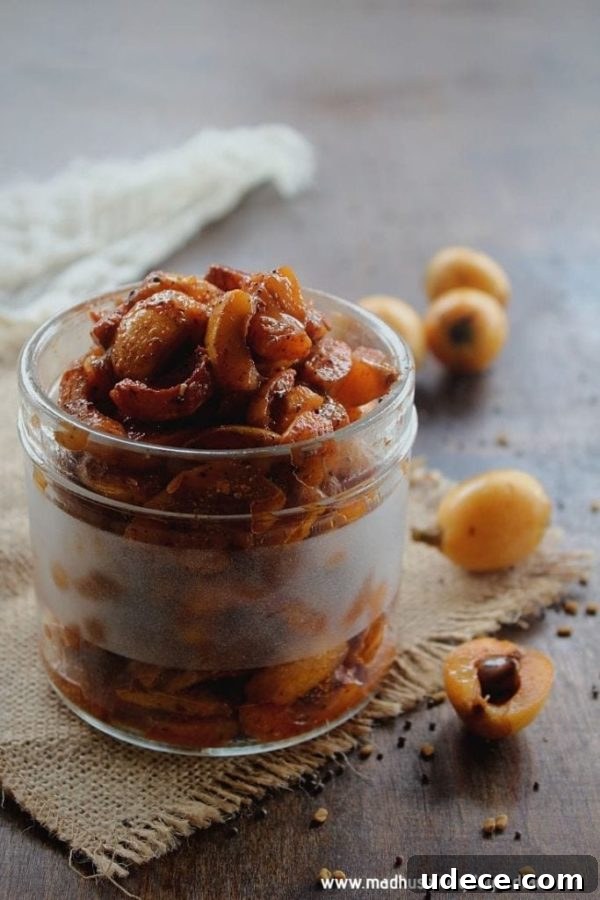 10+ Delicious Loquat Recipes to Try This Season 8 loquat pickle in a jar with fresh loquats around it