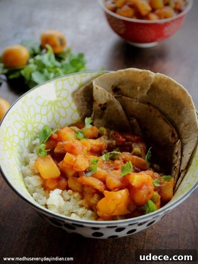 10+ Delicious Loquat Recipes to Try This Season 10 a bowl of loquat potato curry over rice with naan
