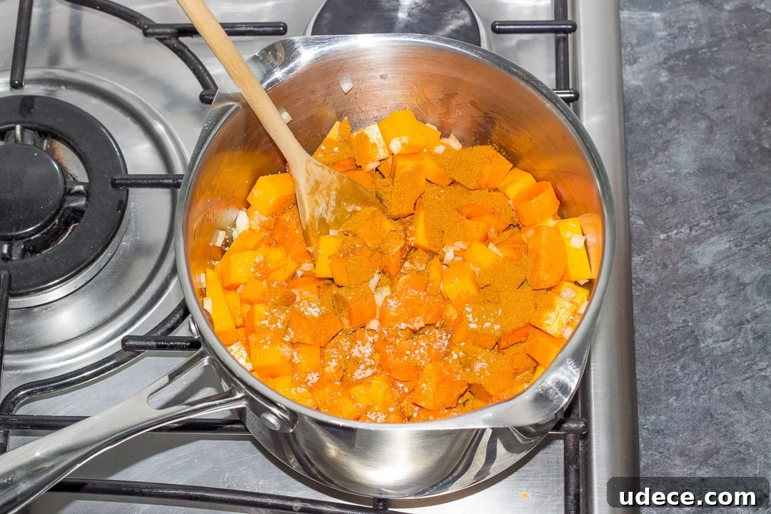 Curried Coconut Lentil Soup with Warm Spices Recipe 15 lentil soup ingredients in a large pot on the hob