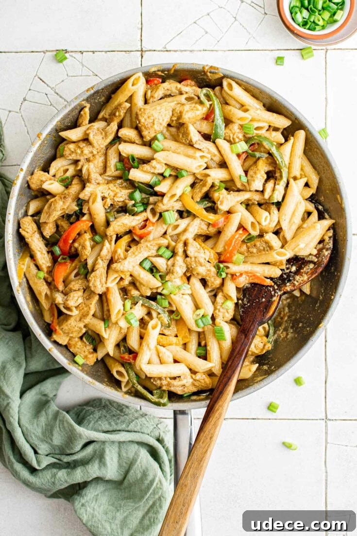 Top-down view of rasta pasta in a skillet