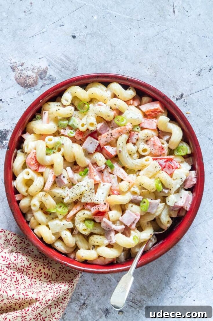 Hawaiian macaroni salad served in a red bowl