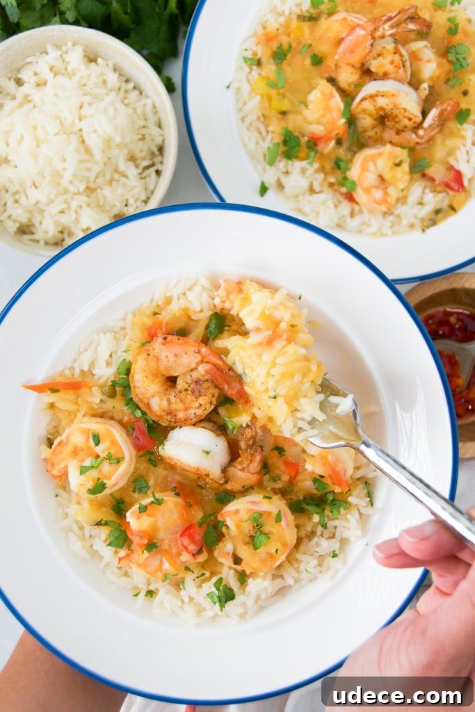 Bobó de Camarão: Creamy Brazilian Shrimp Stew Recipe 10 A fork scoops into a bowl of Bobo de camarao