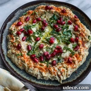 4 Mediterranean Meal Plans for Seasonal August Eating 11 mutabal dip in a plate with pita.