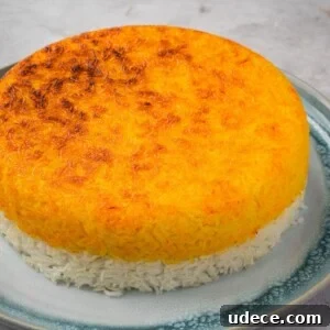 4 Mediterranean Meal Plans for Seasonal August Eating 14 Tahdig Crispy Persian Rice on a platter.