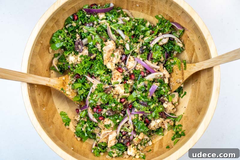 Chicken, Kale & Pomegranate Freekeh Salad with Feta 7 Tossing the salad together