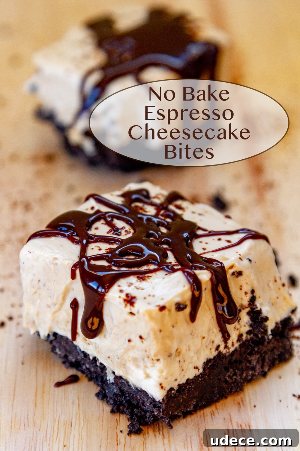 Two No Bake Espresso Cheesecake Bites drizzled with chocolate on a wooden serving board.