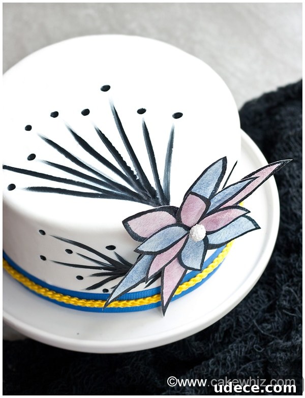 How to Make Delicate Wafer Paper Flowers: Step-by-Step Guide 4 Overhead Shot of White Cake Decorated with Wafer Paper and Black Edible Marker