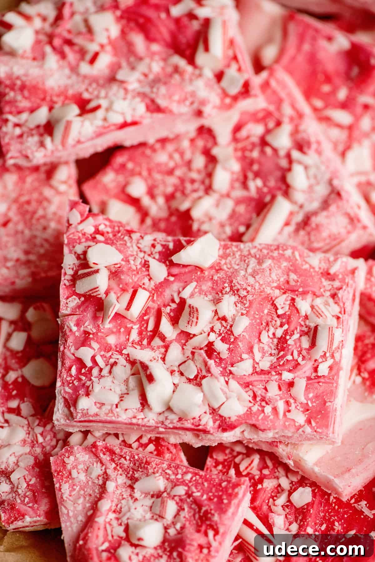 Homemade Christmas Food Gifts and Candies to Make This Year 7 Stack of candy cane bark pieces.