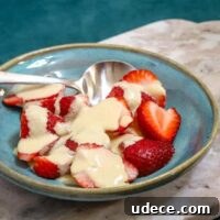 Crème Anglaise: Classic French Vanilla Custard Sauce Recipe 2 Fresh strawberries topped with creamy vanilla sauce.