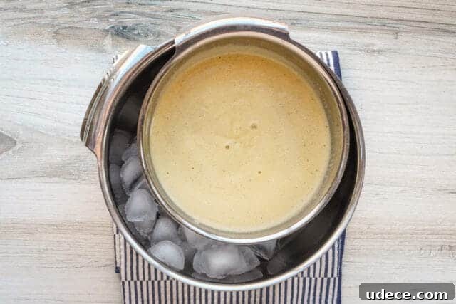 Crème Anglaise: Classic French Vanilla Custard Sauce Recipe 6 Cooling the custard over ice.