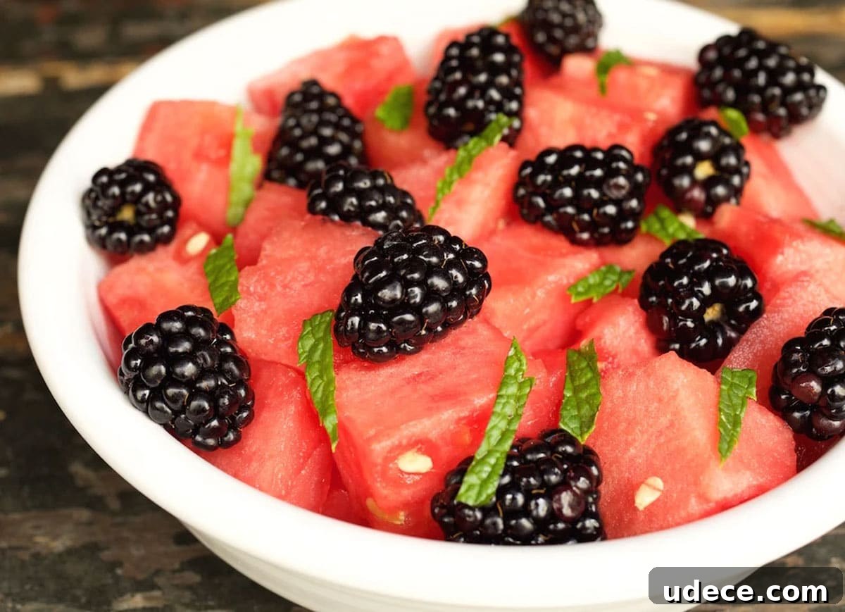 Watermelon and blackberry fruit salad in a bowl.