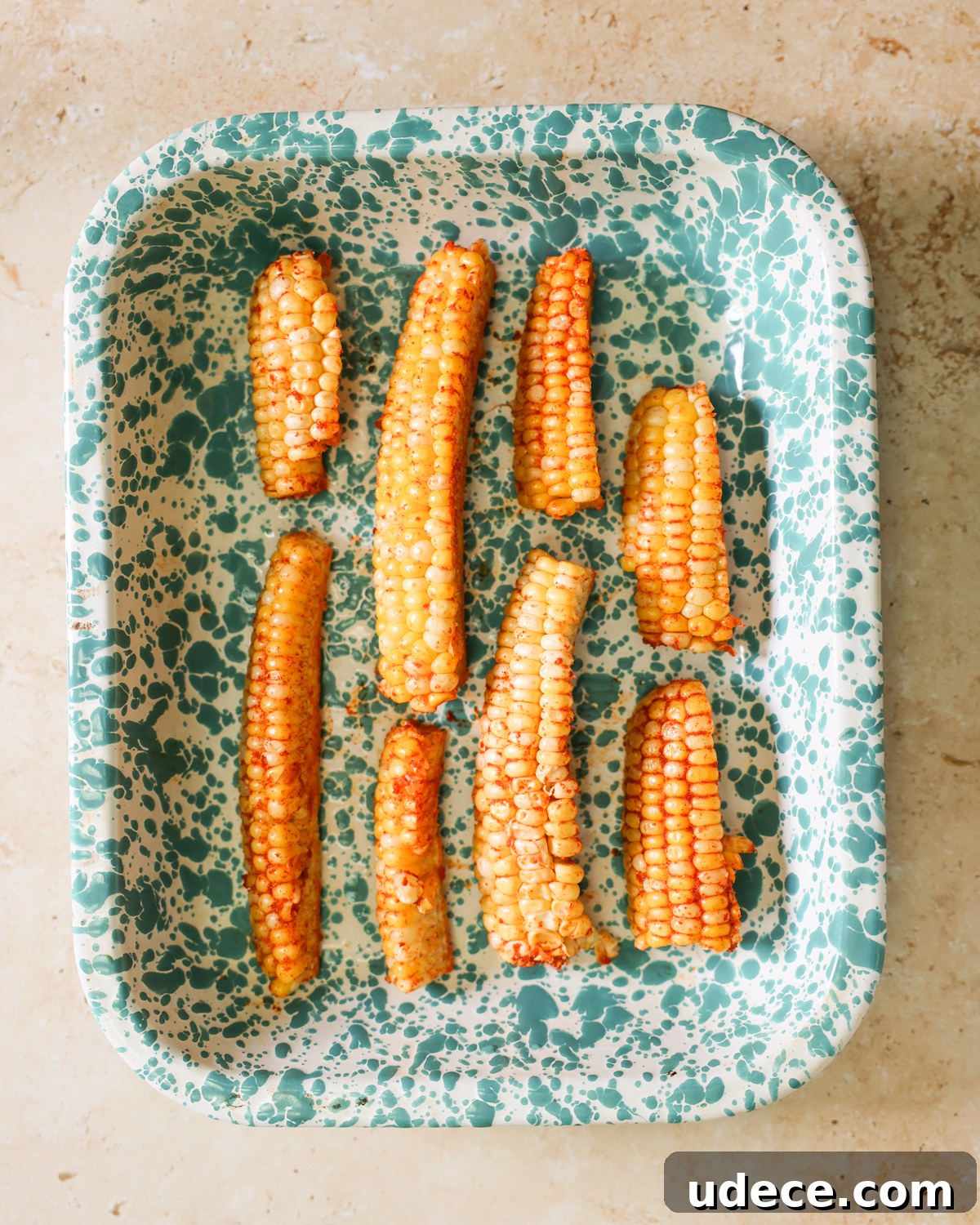 Crispy Corn Ribs Recipe: Tangy BBQ Flavor for Summer Cookouts 7 corn arranged in baking dish