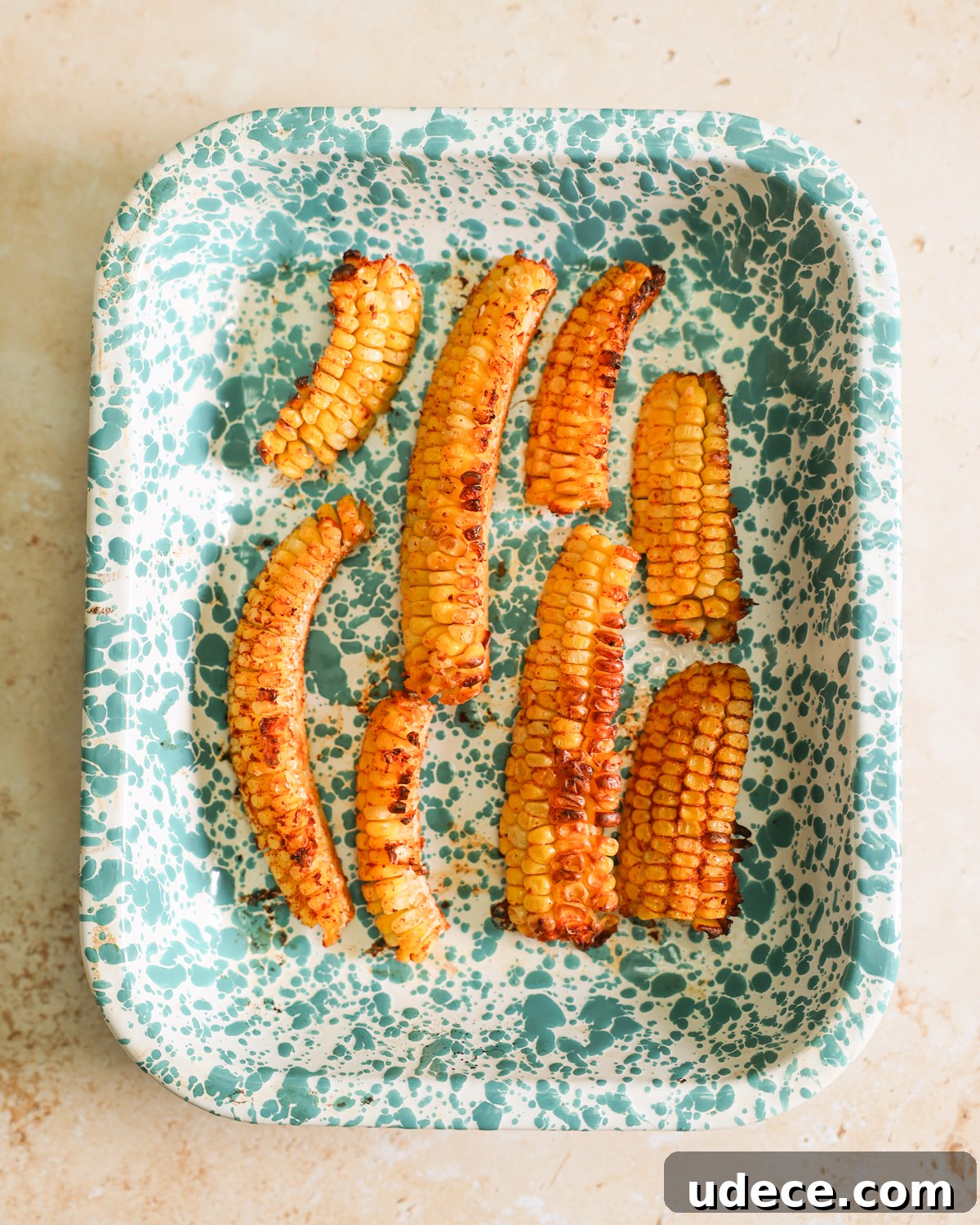 Crispy Corn Ribs Recipe: Tangy BBQ Flavor for Summer Cookouts 8 baked corn ribs in baking dish