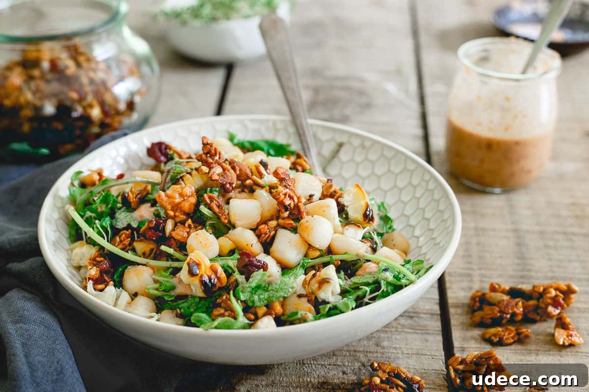 Summer salads don't have to be boring and this bay scallop baby kale and grilled corn one proves it. Topped with a savory tart cherry granola, it's healthy eating made delicious! Summer salads don't have to be boring and this bay scallop baby kale and grilled corn one proves it. Topped with a savory tart cherry granola, it's healthy eating made delicious!
