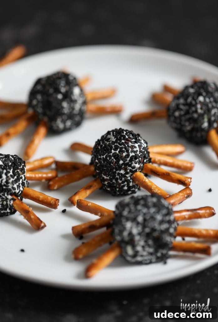 Creepy Spider Cheeseballs Recipe for Halloween Party Snacks 10 Pretzel legs for cheeseballs
