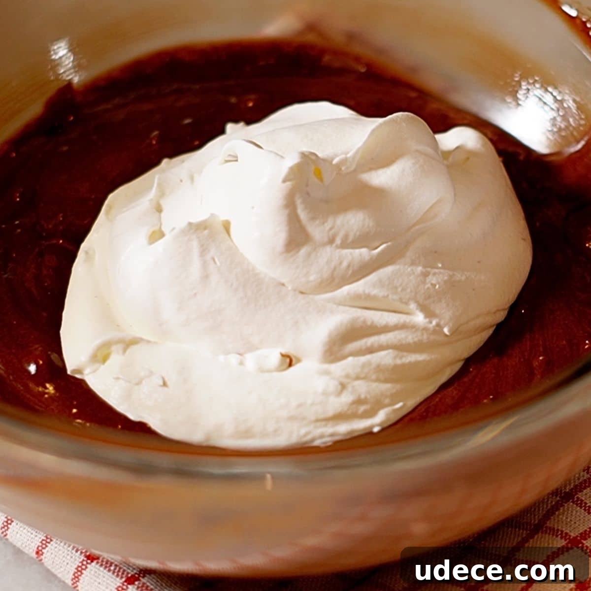 Decadent French Silk Pie Recipe: Smooth Chocolate Silk Pie 20 Adding the whipped cream to the chocolate mixture.
