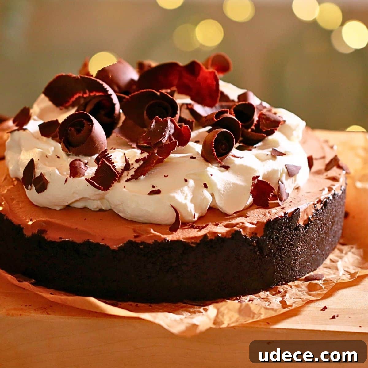 Decadent French Silk Pie Recipe: Smooth Chocolate Silk Pie 3 The best French silk pie with Oreo crust, chocolate mousse filling, whipped cream topping, and chocolate curls