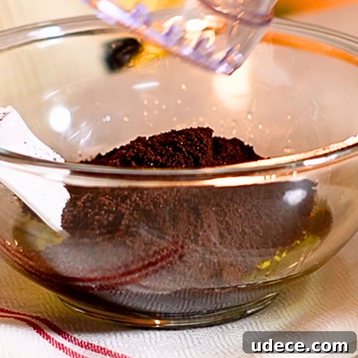 Decadent French Silk Pie Recipe: Smooth Chocolate Silk Pie 10 Combining the grounded Oreo and melted butter in a bowl.