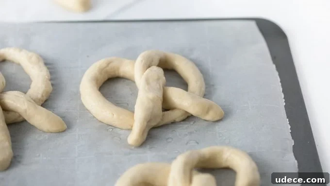 Quick 30-Minute Soft Pretzels Recipe You Can Make at Home 3 Twist pretzel dough into homemade soft pretzels