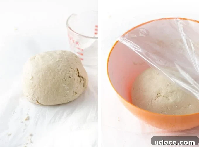 Quick 30-Minute Soft Pretzels Recipe You Can Make at Home 8 Ball of dough in bowl with plastic wrap to make homemade soft pretzels
