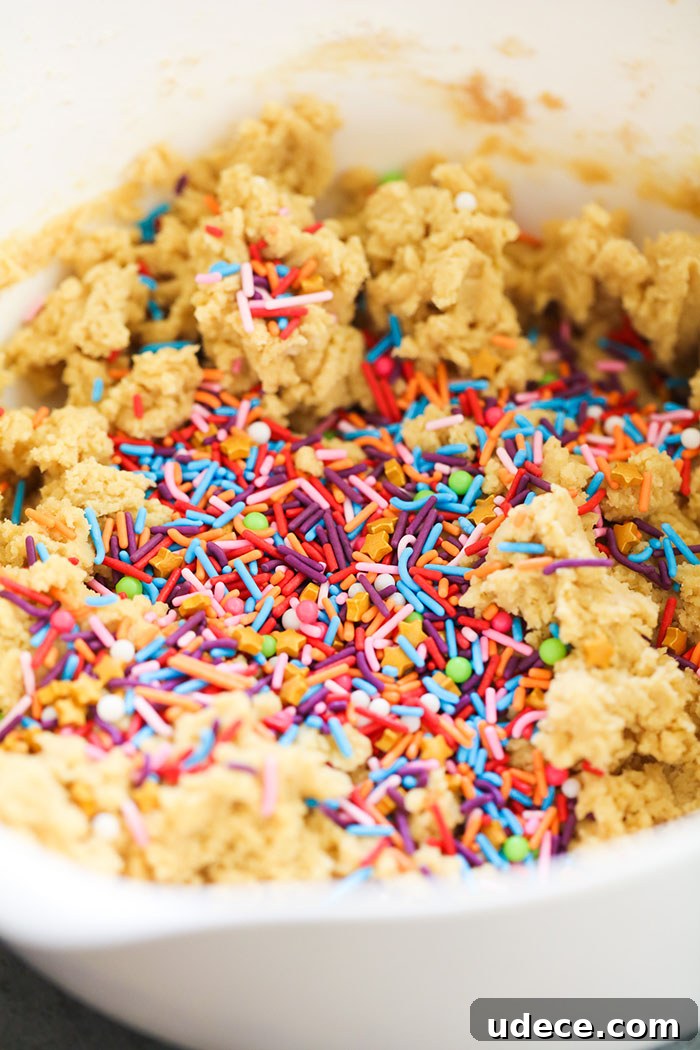 Chewy Cake Batter Cookies Made with Instant Pudding 3 Close up of a cookie showing sprinkles