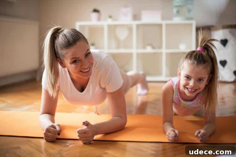 Family Fitness Plan: Fun Workouts to Get Everyone in Shape 2 mother and daughter doing planks to strengthen core muscles