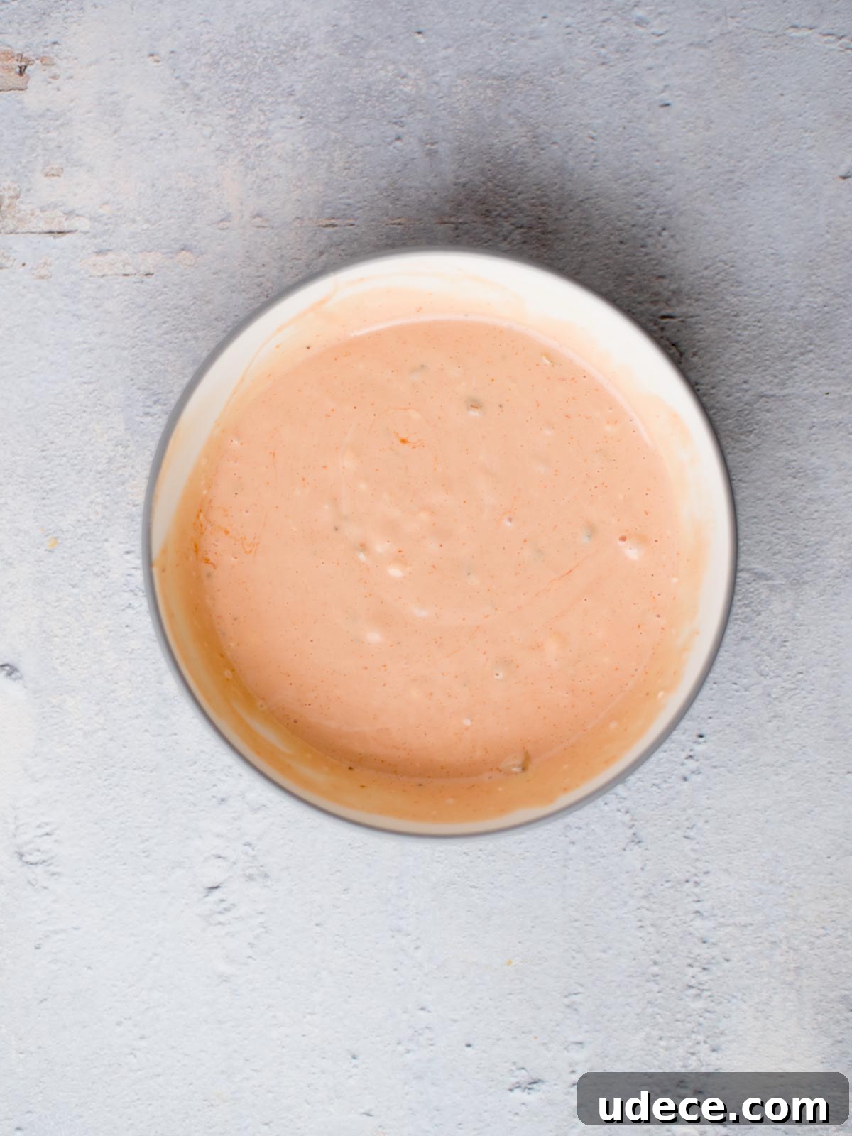 Copycat Big Mac Salad Recipe for Classic Burger Flavor 5 big mac salad dressing in a bowl