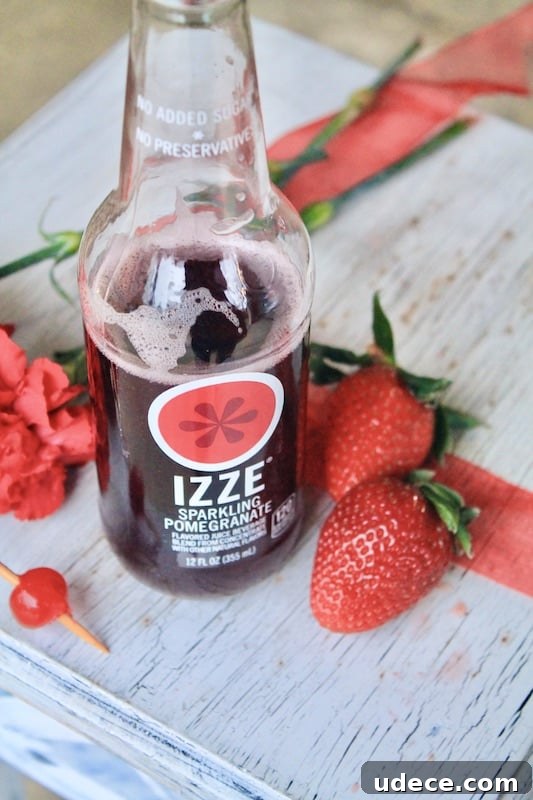 Sparkling Strawberry Satin Kiss: Valentine's Day Rum Cocktail 13 use izze pomegranate sparkling juice as a topper and sparkling wine