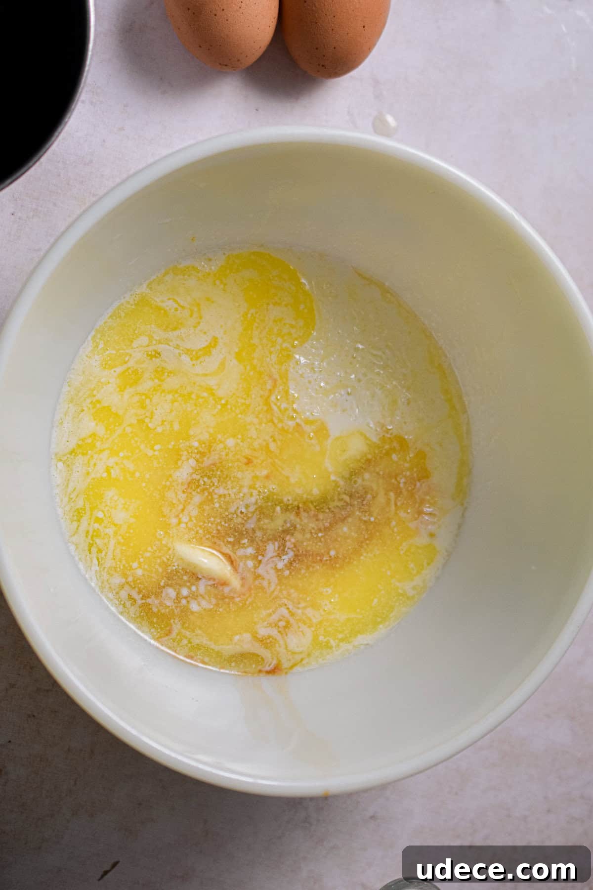 The wet ingredients are added to the bowl.