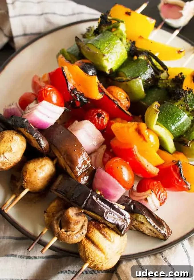 Colorful Grilled Vegetable Kabobs with Zesty Marinade 8 These rainbow veggie kabobs are the perfect summer side dish! Serve them with my delicious and easy to make grilled lemon garlic sauce.
