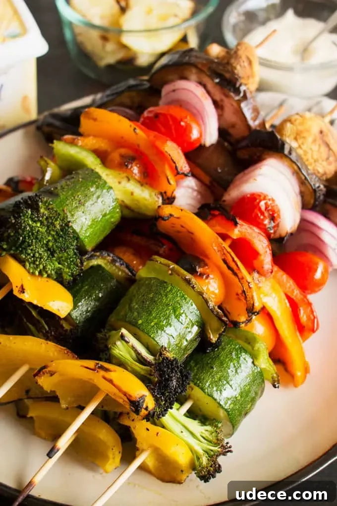 Colorful Grilled Vegetable Kabobs with Zesty Marinade 5 These rainbow veggie kabobs are the perfect summer side dish! Serve them with my delicious and easy to make grilled lemon garlic sauce.