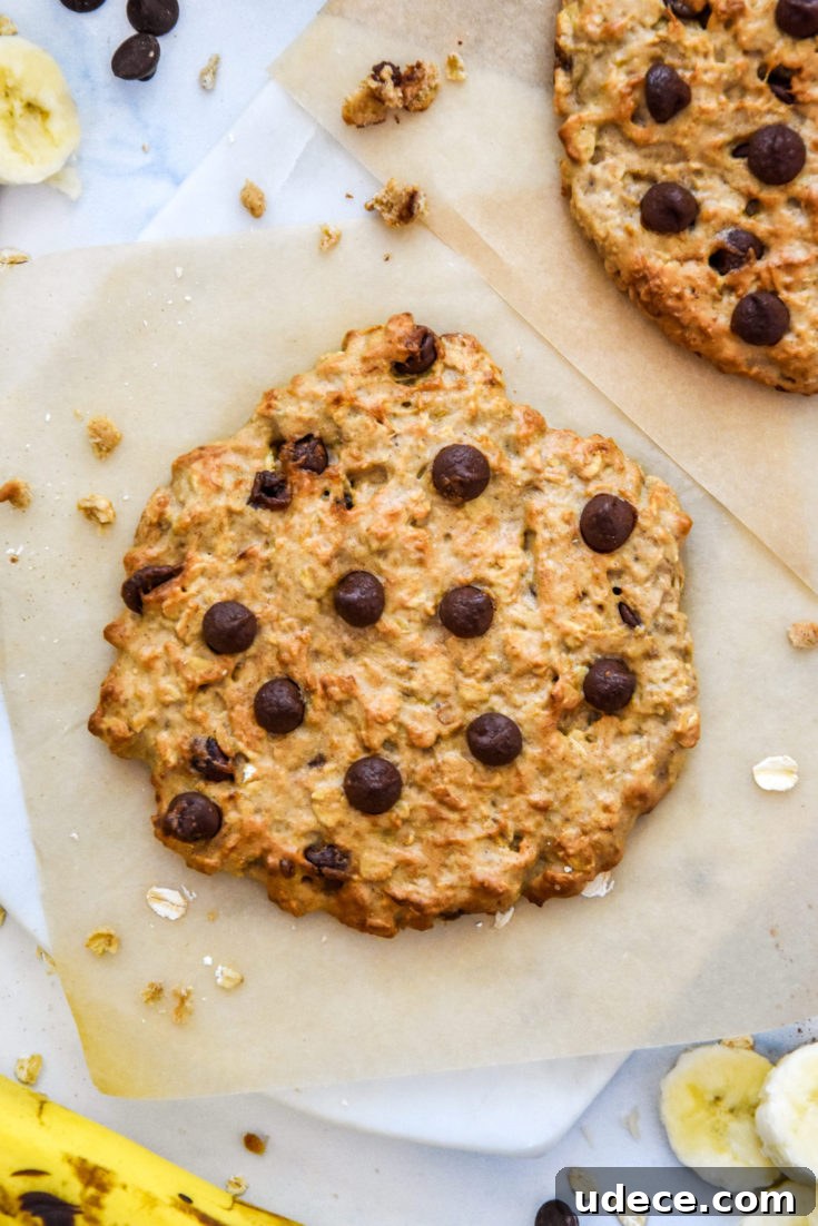 Air Fryer Banana Oatmeal Cookie for one with chocolate chips on top.